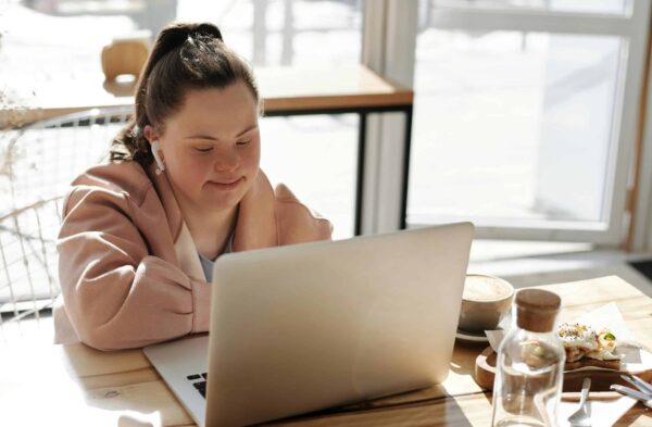 Participant reading new ndis reforms scaled